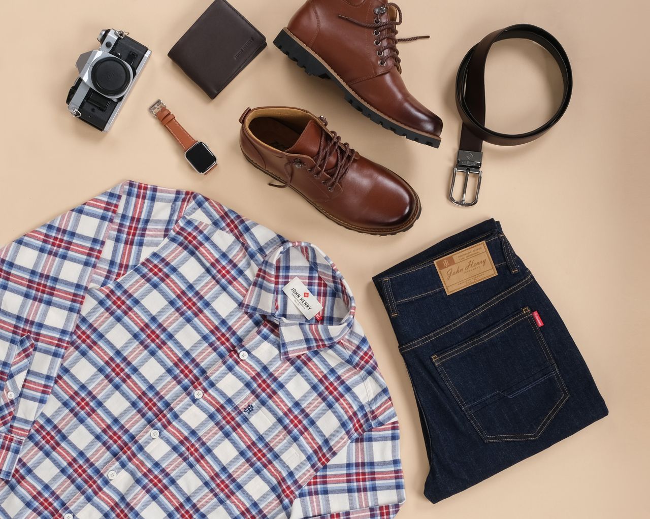 collection-03 Stylish flat lay of men's outfit essentials with accessories on a beige background.