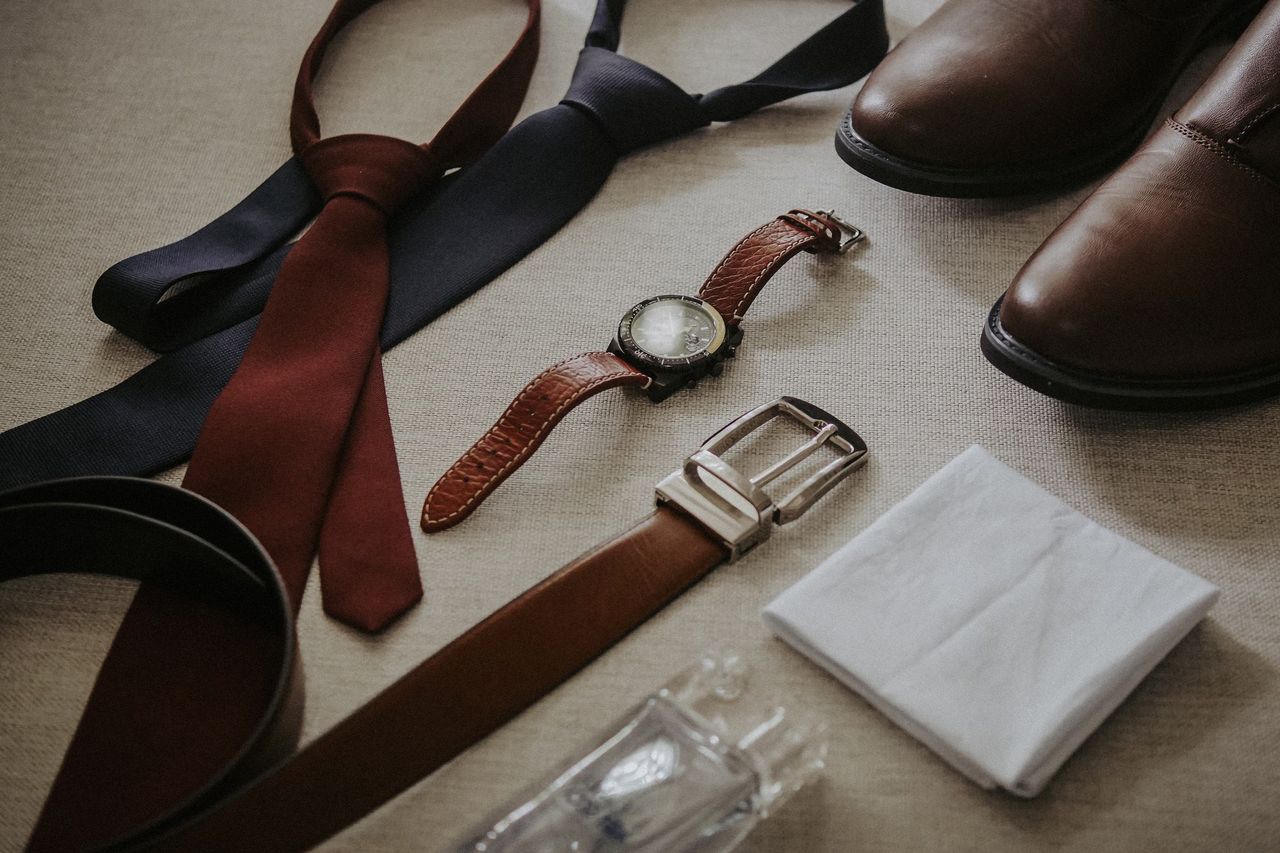 collection-02 Stylish men's accessories including ties, watch, shoes, belt, and handkerchief.